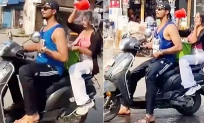 চলন্ত স্কুটারে তরুণ-তরুণীর গোসল, ভিডিও ভাইরাল চলন্ত স্কুটারে তরুণ-তরুণীর গোসল, ভিডিও ভাইরাল